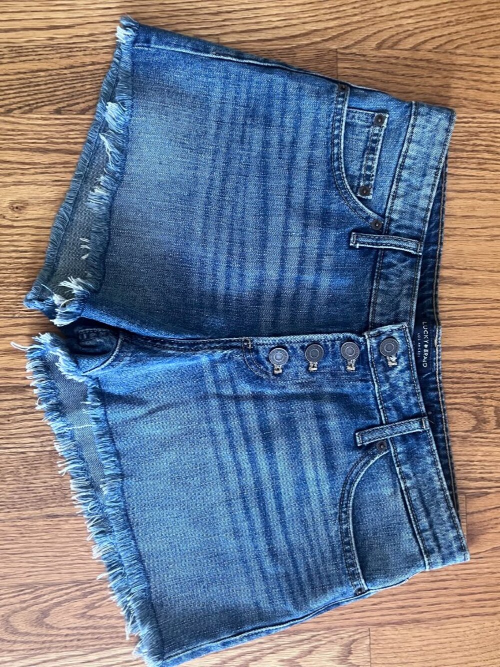 Lucky Brand cut off button down denim shorts, Size 8.